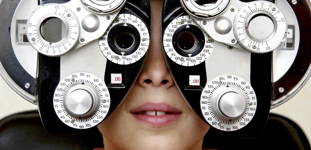 Boy getting eye exam